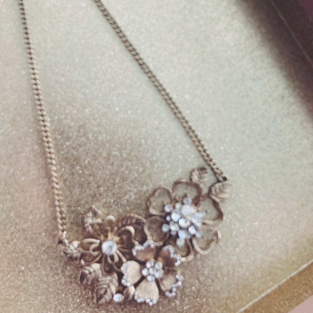 Fun floral necklace; cubic zirconia stones.